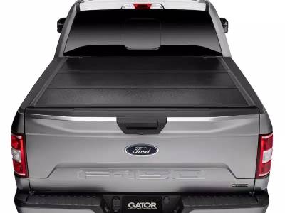 Undercover - Tapa plegable Gator para Ram 1500 02-18 6.5'